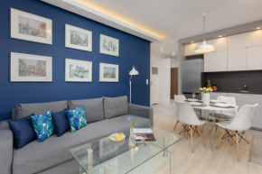 Wola Apartment with Balcony Sokołowska by Noclegi Renters
